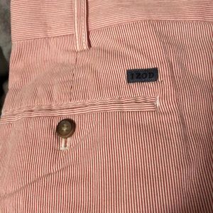 Vintage Izod red and white pinstriped shorts. Size 42 men.